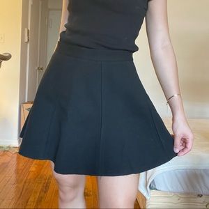 Black Textured Skater Skirt by Zendaya